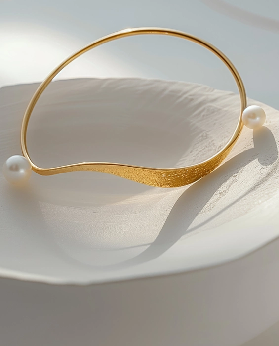 Bracciali rigidi scultorei